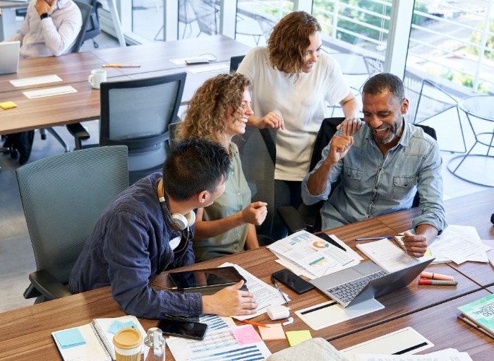 group of people collaborating over a joint work project