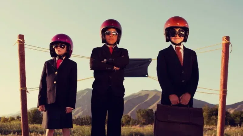 children in suit, acting like adults as pilots