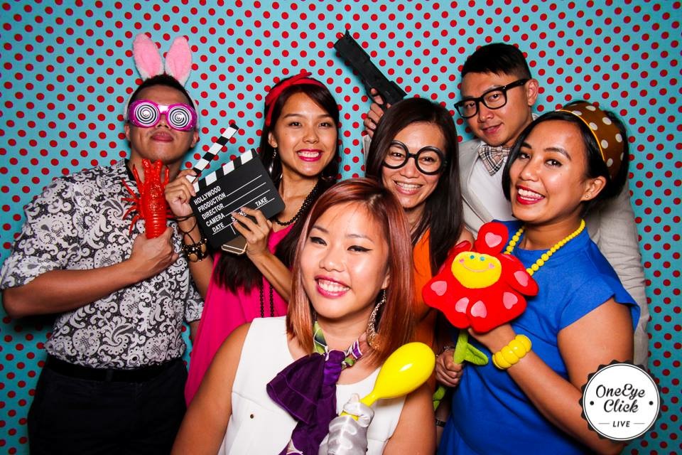 group of people in fancy dress photobooth