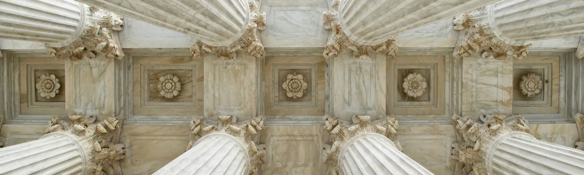 Stone pillars and ornate ceiling from a historic building