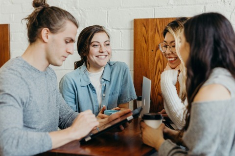 Gen Z talking around a table