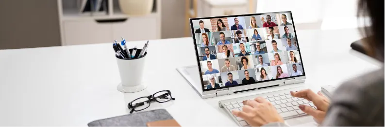 Someone on a zoom call on a laptop