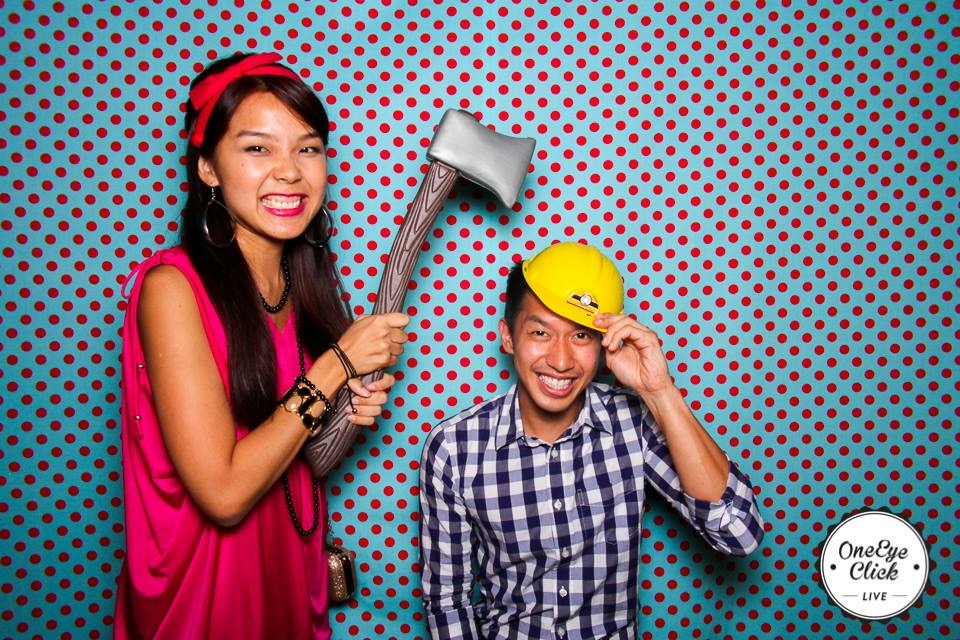 girl holding axe in photobooth