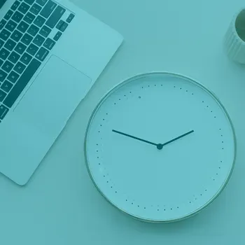 Green image of clock and laptop