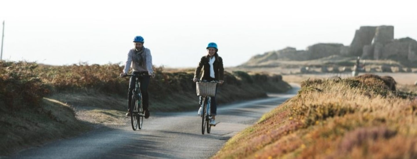 Couple cycling in Jersey