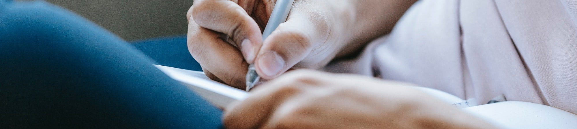 Generic image of a person writing notes