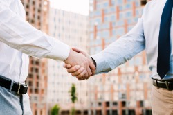 Two people shaking hands