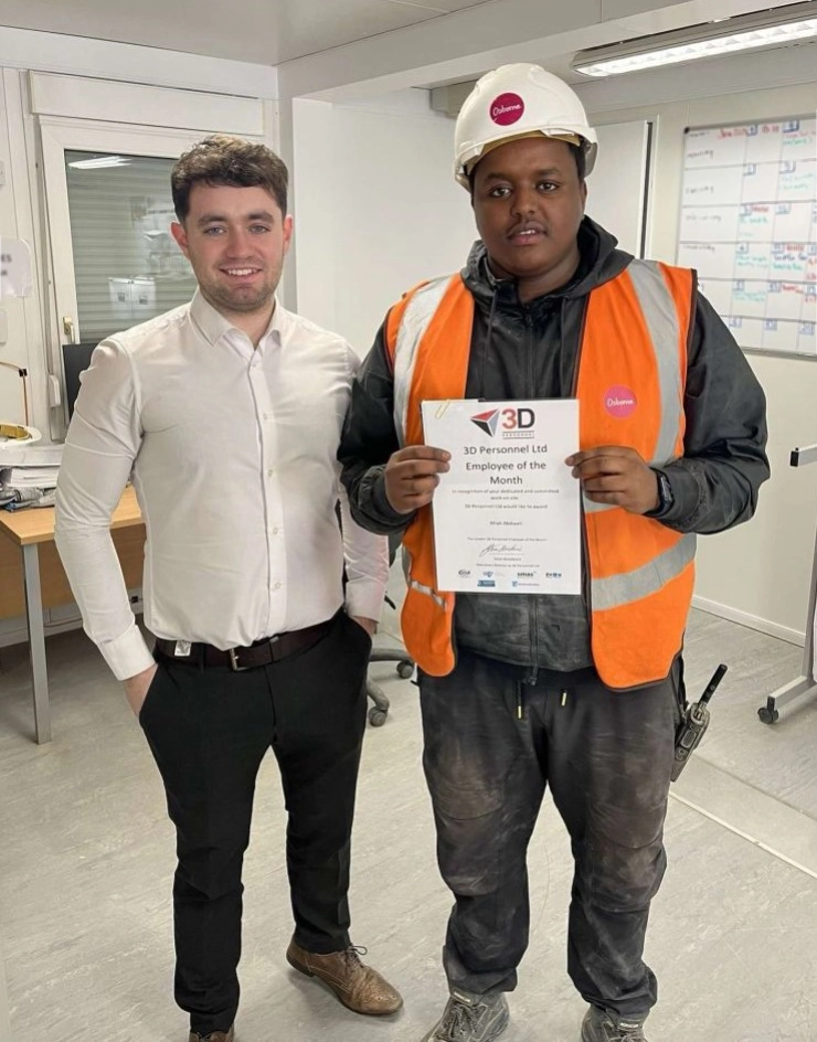 Oran presents Afrah with his award on site in London