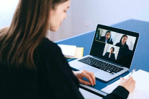 Woman at laptop during a video interview