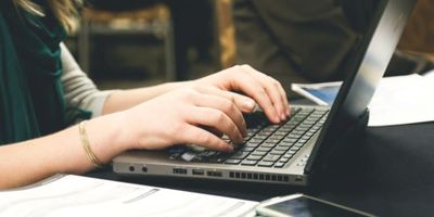 Blog Woman Working on Laptop