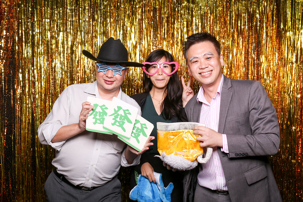 Photobooth photo with two men a woman