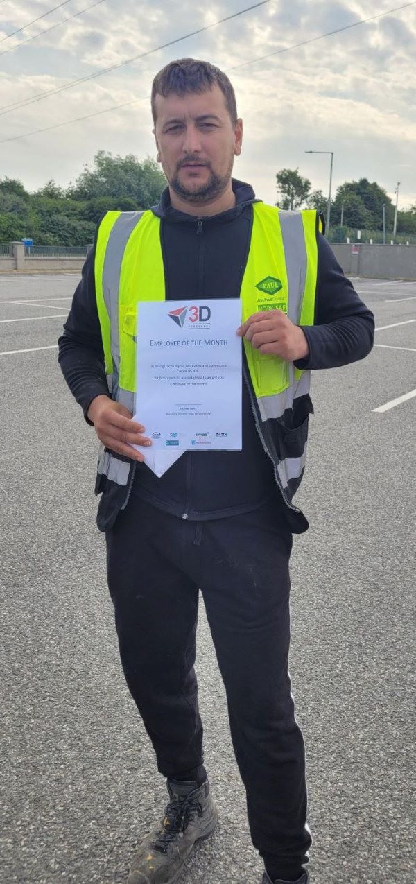 3D's Alexandru with his award on site in Leixlip