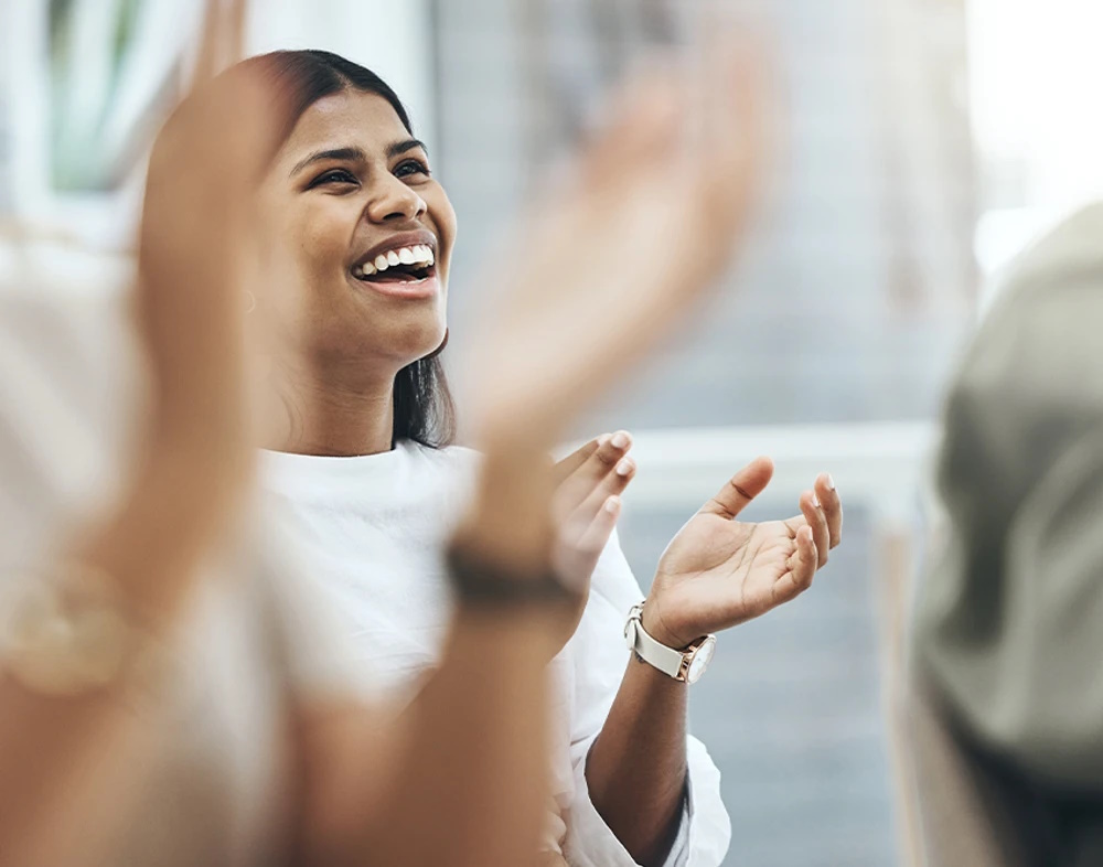 A woman clapping