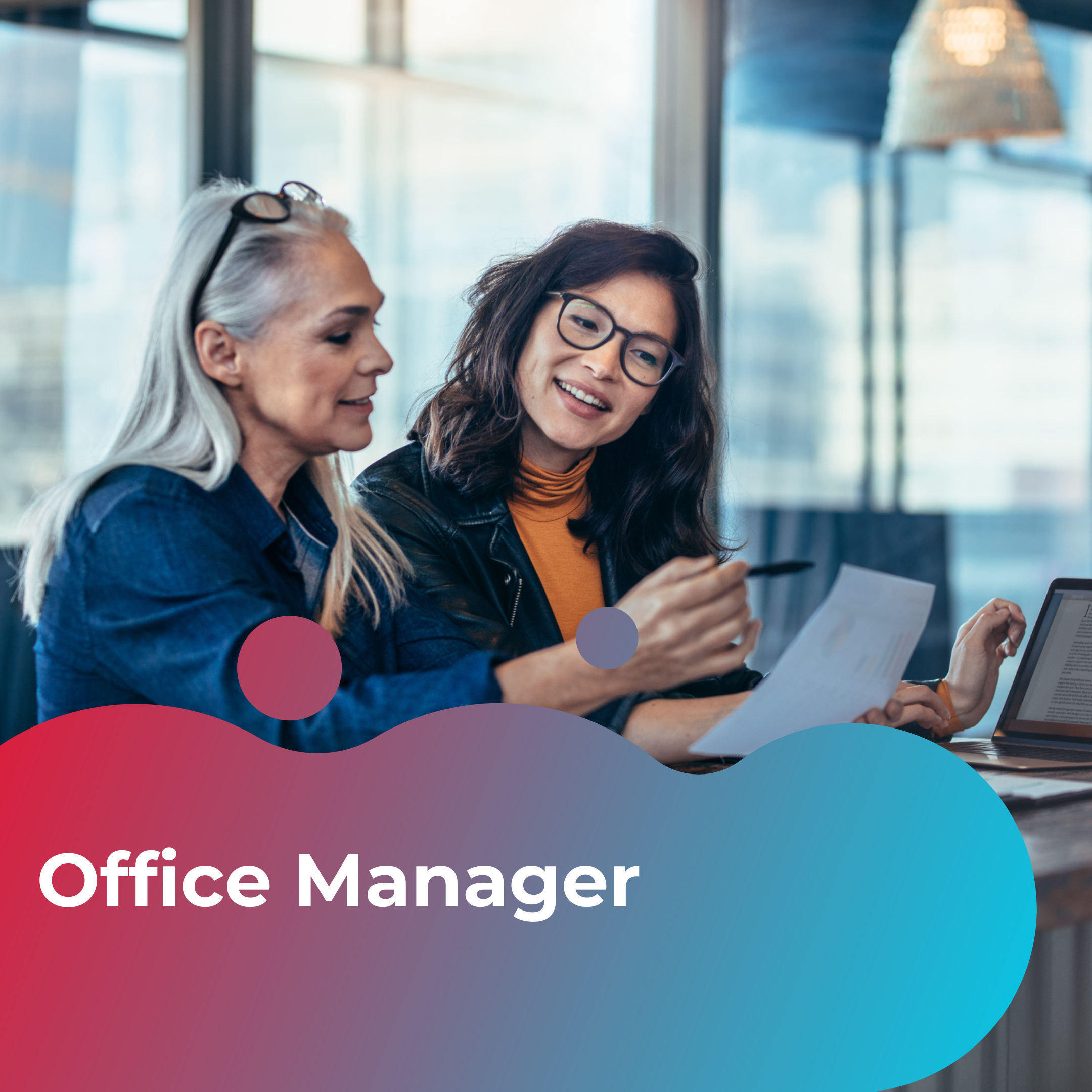 Office Manager Case Study. Image shows two women looking at a laptop and talking in an office setting.