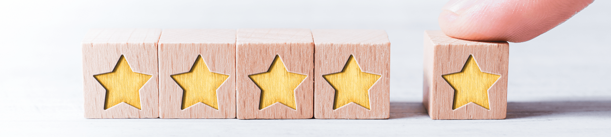 5 stars made on wooden blocks
