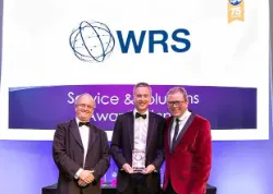 Mark Brown collecting WRS EIC Service and Solutions Award 2018