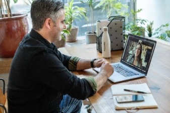 Colleagues talking on video call