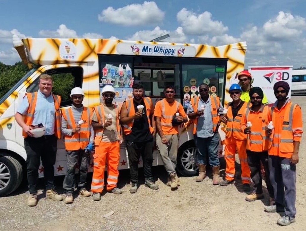 3D operatives pose in front of Mr Whippy's ice cream van