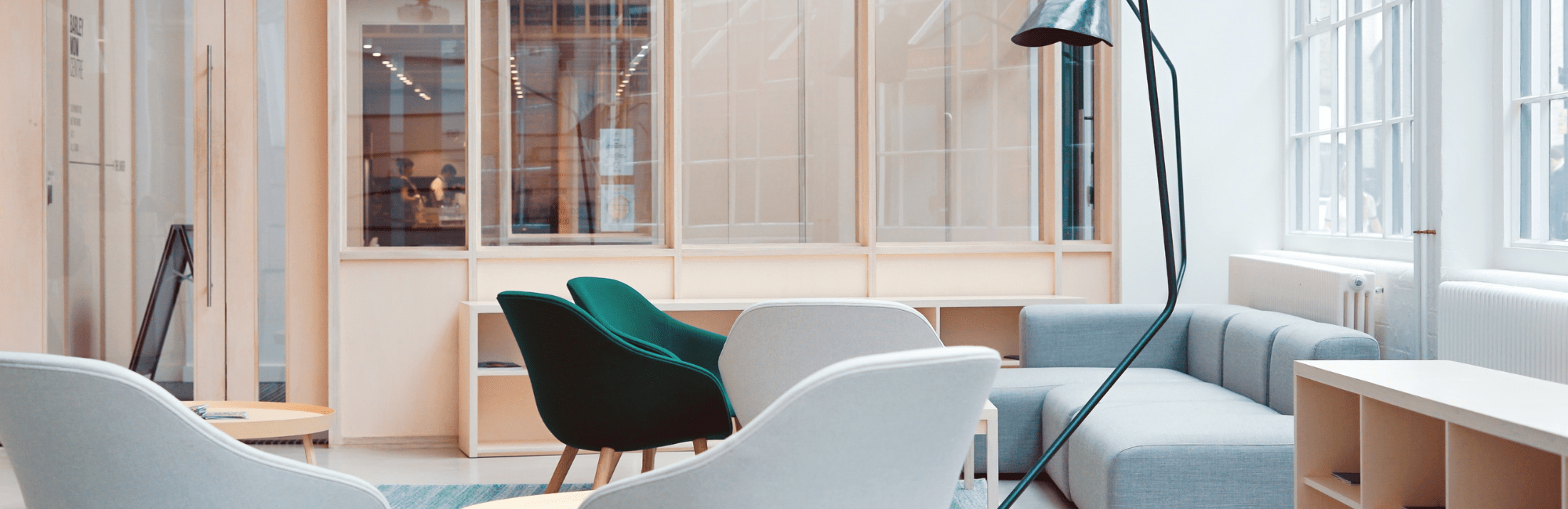 A room showcasing an abundance of chairs surrounding a sizable table.