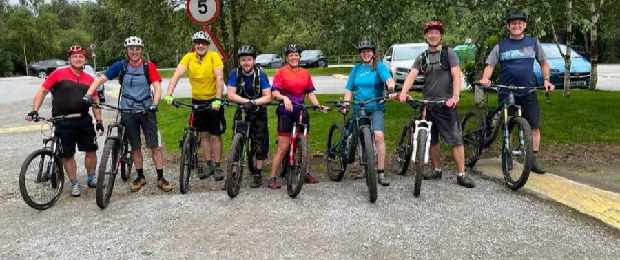 a bunch of our clients posing for a pre-cycle pic at our Social Cycling networking event in Leeds.
