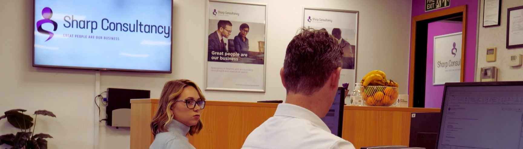 Alex talking to Liam O'Flaherty in our Leeds office