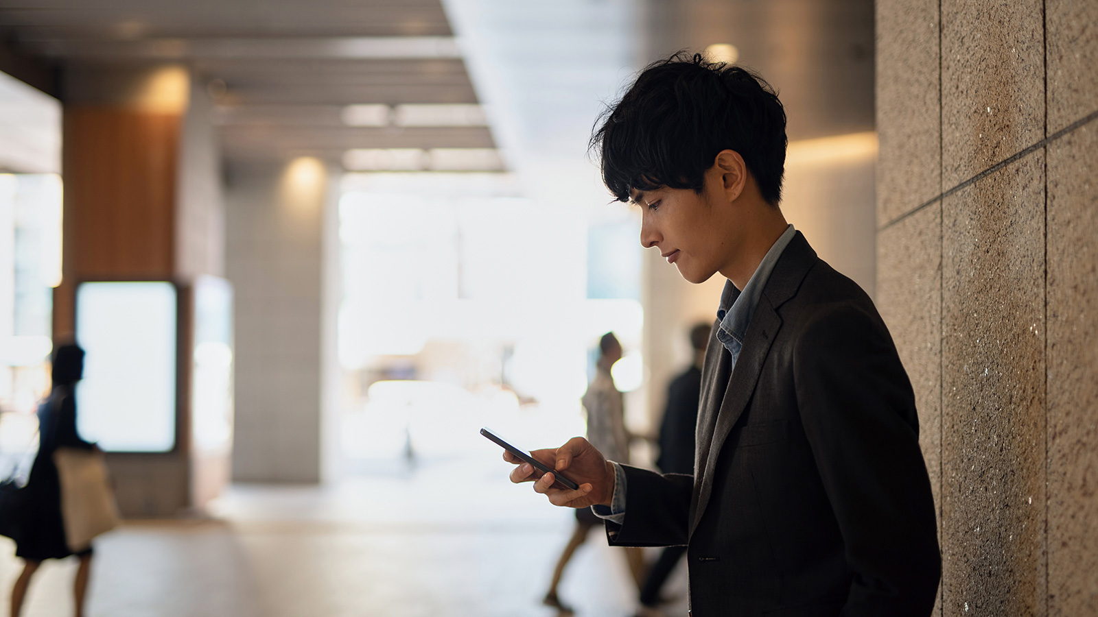 employee-with-his-phone