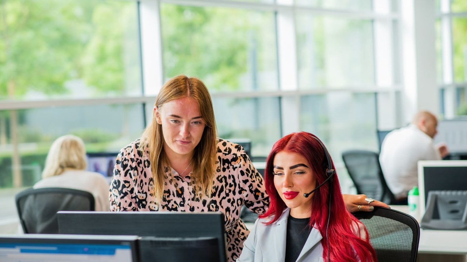 two ladies in contact centre setting